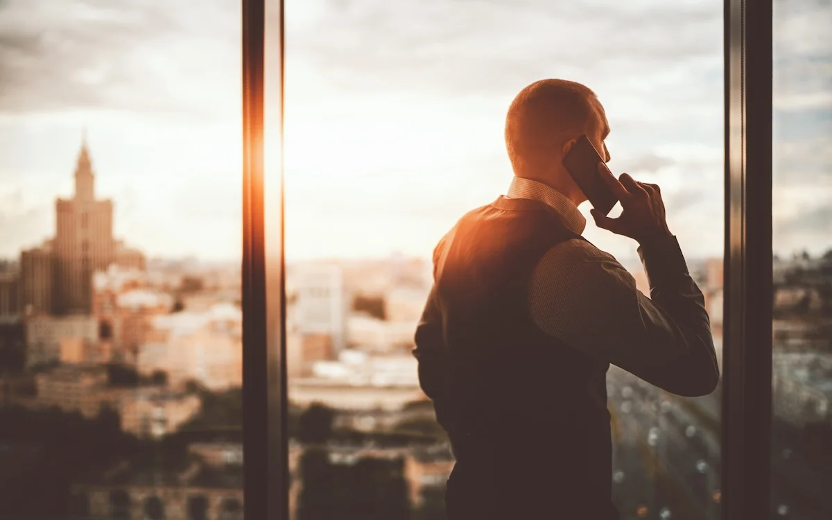 An executive looking out across a city